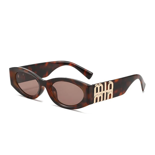 Hollow-out cat's eye sunglasses drag elder sister new tide concave fashion street shooting ultra-black sunglasses female ins.